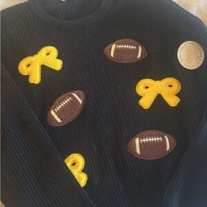 Black Sweater with Yellow and Brown Patches